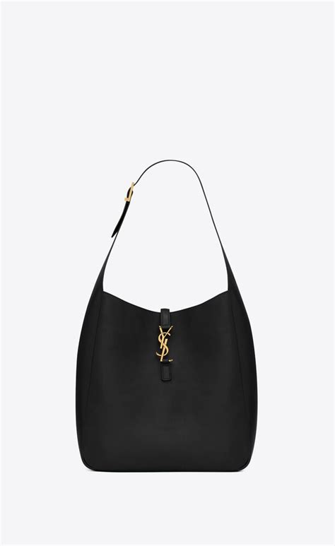 ysl le 5 a 7 supple large|LE 5 À 7 supple LARGE in grained leather .